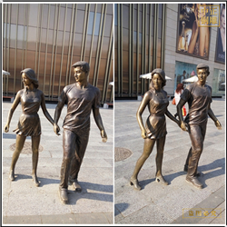 商場門前情侶拉手銅雕塑 商場門前情侶拉手銅雕塑